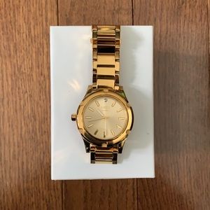 Nixon Unisex Gold Watch - “The Camden”